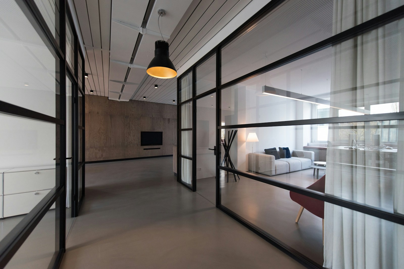 Clean coworking space with shared desks and meeting areas
